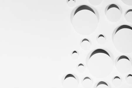 Geometric pattern of white circles in hard light with strict black contrast shadows in random, border, copy space, top view. Minimalist modern stable calm abstract background.の写真素材