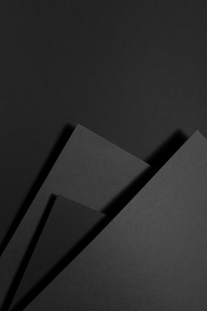 Dark gray carbon textured abstract geometric background with soar stepped rectangle surfaces,...