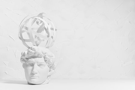 Idea and brainstorming abstract concept with image of creativity process as sphere of spinning thoughts around head of white thinking statue David. Idea of thinking and research solution.の写真素材