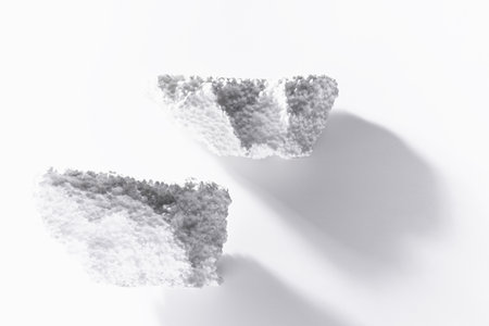 foam podiums for presentation cosmetic products or goods as elegant white islands fly in sky in hard light with shadows in elegant grunge modern style. Template stage for advertising and design.の写真素材