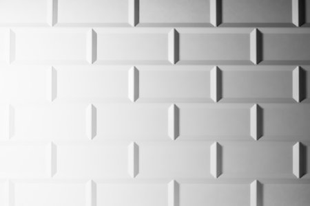 White glossy ceramic rectangle tile as texture, pattern, abstract background with gradient, grey shadows and light, top view. Elegant mosaic texture of porcelain tile.の写真素材