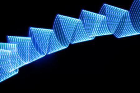 Blue neon curved wave of light as curls or swirl with smooth stripes on black background. Abstract background with motion light effect, light painting in holiday style.の写真素材