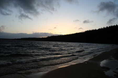 Loch Morlich at dusk, Cairngorms, Scotlandの写真素材