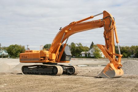 excavator at building siteの写真素材
