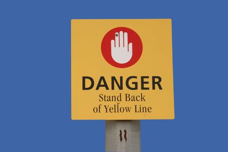 stand back from yellow line signの写真素材