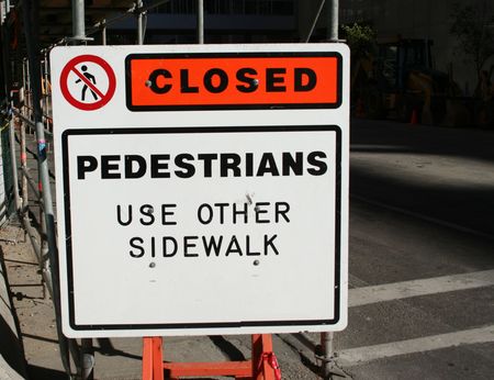 sidewalk closed sign at construction siteの写真素材