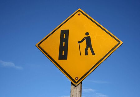 Attention hikers crossing signの写真素材