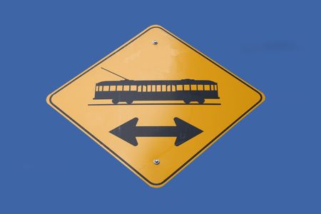 attention tram crossing ahead road signの写真素材