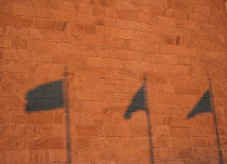 Washington monument and shadows of flags at duskの写真素材