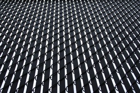 metal fence with black plastic slats background
の写真素材