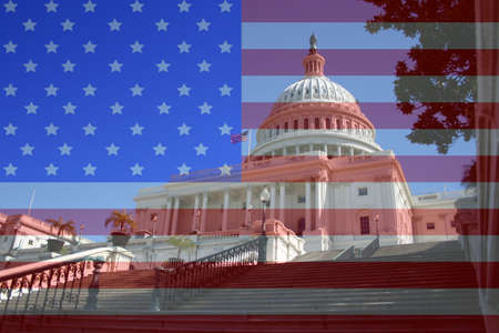Capital building Washington DC against American flagの写真素材