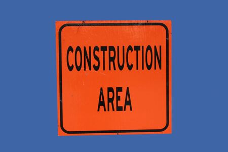 bright orange construction area signの写真素材