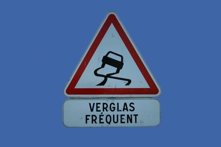 French caution slippery road signの写真素材