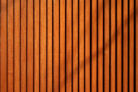 wooden slats background with vertical overlapping boardsの写真素材