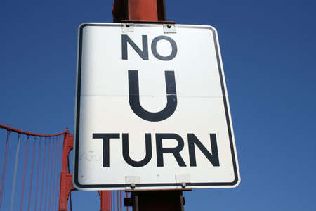 No U turn sign isolated on blue on Golden Gate Bridgeの写真素材
