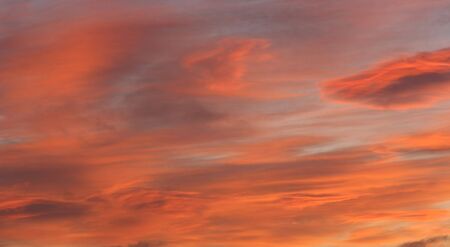 Beautiful pre dawn sky with red and orange clouds