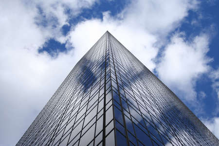 Corner of modern building against blue skyの写真素材