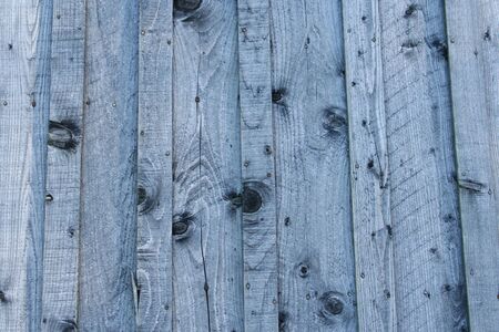 wooden fence with grain backgroundの写真素材