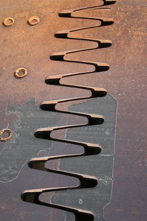 Metal interlocking teeth on bridge background
