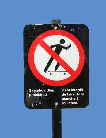 No skateboarding sign bilingual in French and Englishの写真素材