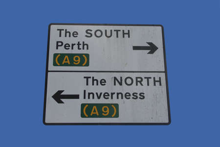 Road sign on A9 with north and south directionsの写真素材