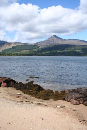 Goatfell from beach on Brodick Bay Isle of Arran Scotlandの写真素材