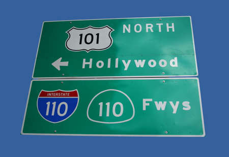 sign to Hollywood freeway and interstate 110 in downtown Los Angelesの写真素材