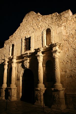 front facade of Alamo San Antonio illuminated at nightの写真素材