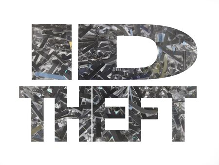 ID theft text with shredded paper inverted colour backgroundの写真素材