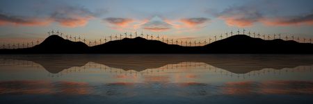 Wind farm on coast reflected at sunset illustrationの写真素材