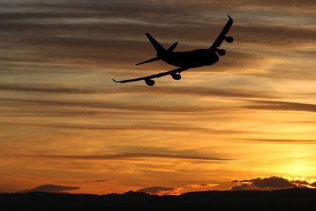 plane taking off at sunset illustration