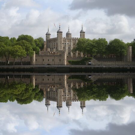 Tower of London reflected in River Thames