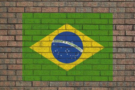 Brazilian flag painted on brick wall illustrationの写真素材