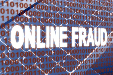 glowing Online Fraud text over binary text and keyboardの写真素材