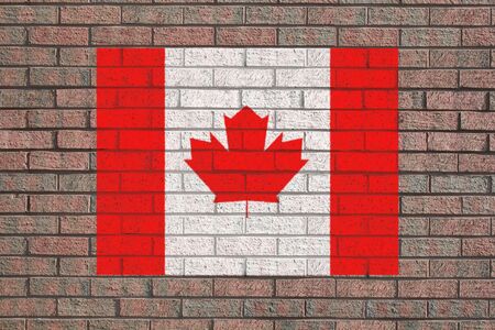 Canadian flag painted on brick wall illustrationの写真素材