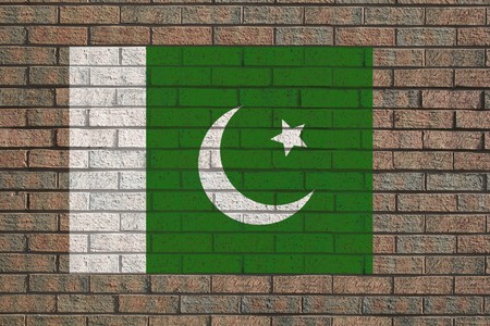 Pakistan flag painted on brick wall illustrationの写真素材