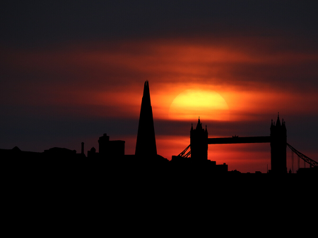 London skyline silhouette with sunset illustrationの写真素材