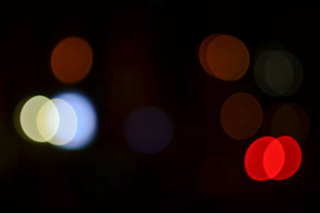 Blurred city lights background at nightの写真素材