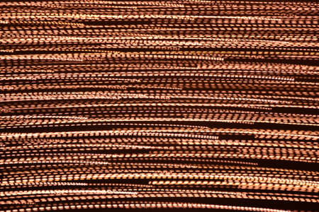 Abstract golden lines on brown backgroundの写真素材