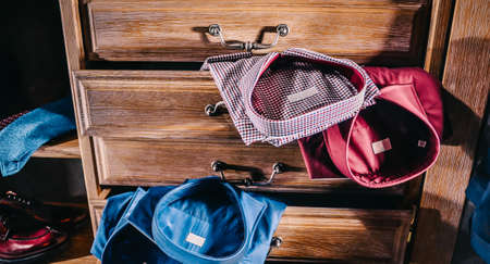 Male fashion stylish clothes in home wardrobe. Shirts, ties, shoesの写真素材