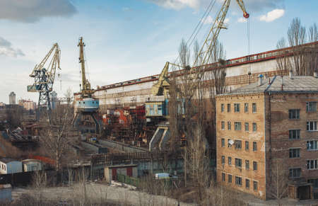 Industrial zone. Cranes and factoryの写真素材