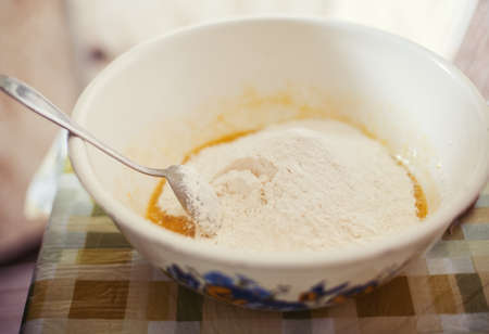 Preparing batter for pancakesの写真素材