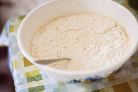 Preparing batter for pancakesの写真素材