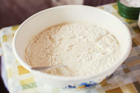 Preparing batter for pancakesの写真素材