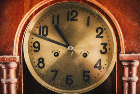 Old vintage dusty clock close upの写真素材