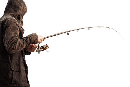 Man fishing with a spinning isolated on white backgroundの写真素材