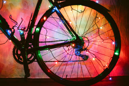 Bicycle decorated with Christmas lightsの写真素材
