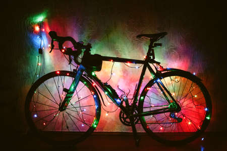 Bicycle decorated with Christmas lightsの写真素材