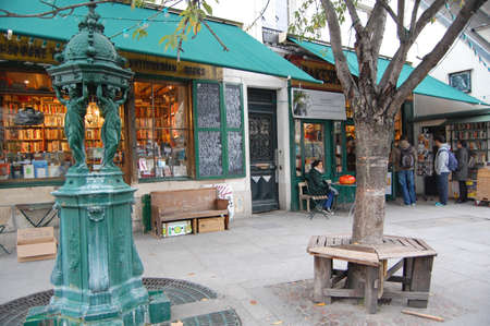 Paris, France - October 30, 2012: people outside the famous Shakespeare bookstore in Paris, France. Opened by George Whitman in 1951, the bookshop is a popular tourist attraction.のeditorial素材