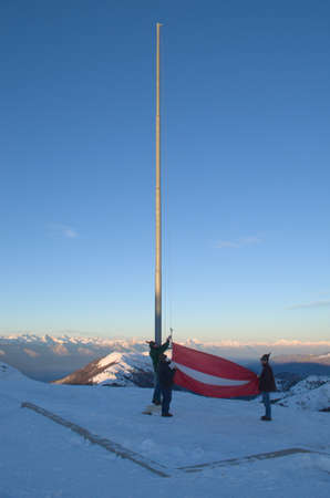The flag raising of an austrian flagの写真素材